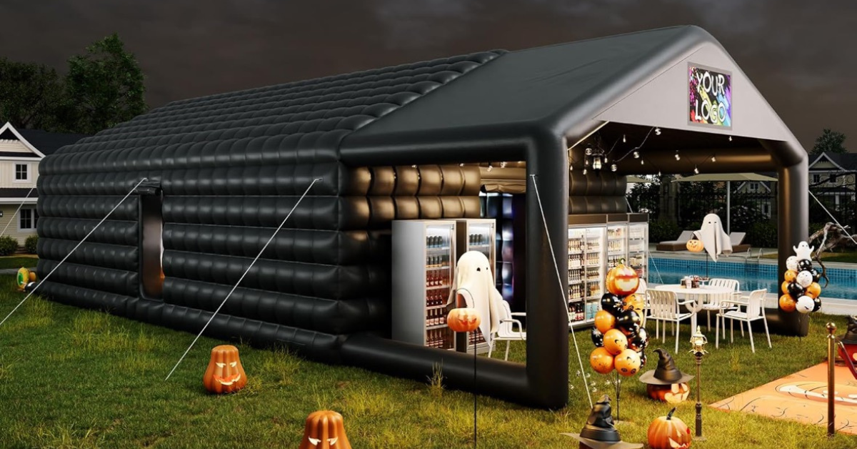 Inflatable party tent at night with event lighting — Pop Party Co.